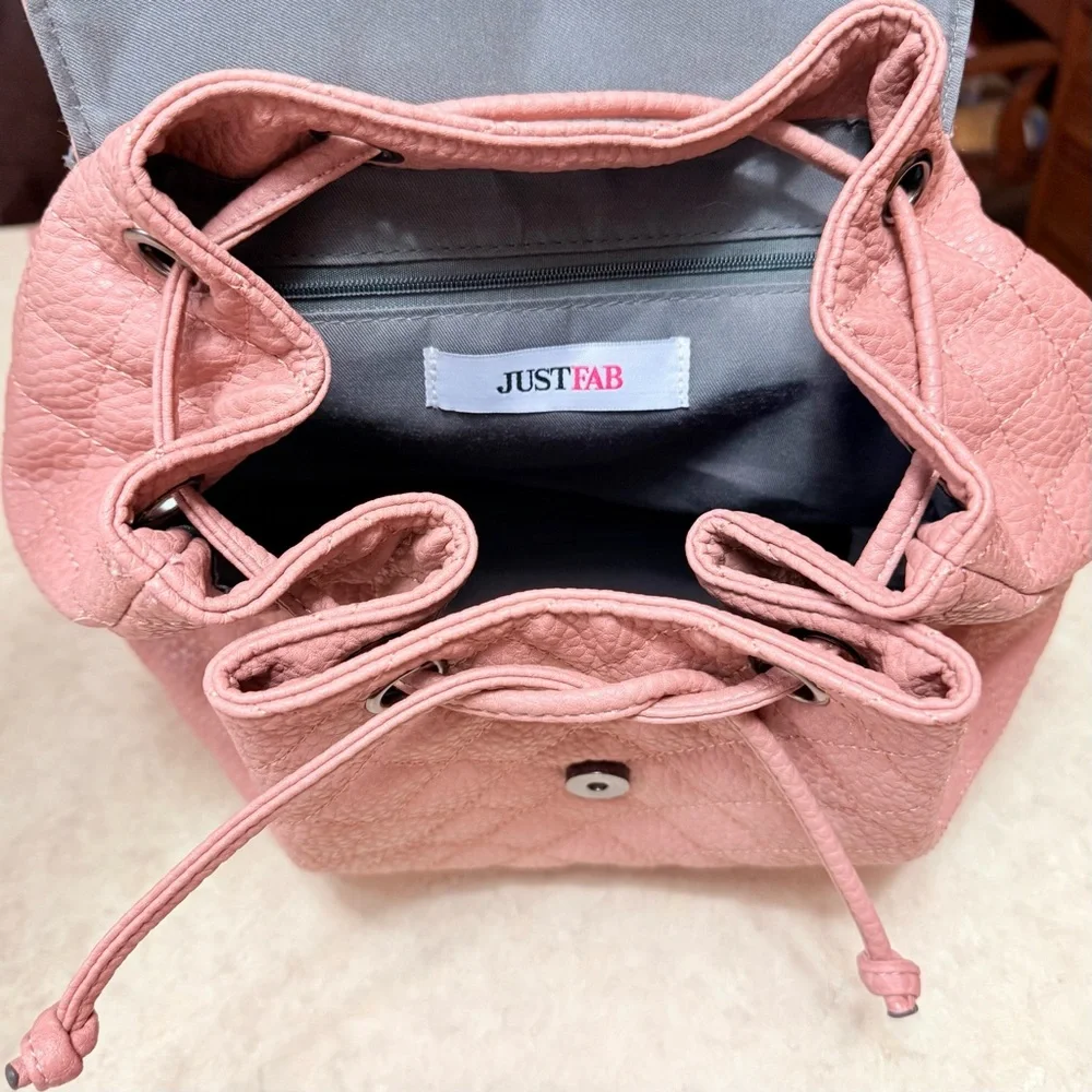 Daryll Quilted Faux leather drawstring bucket backpack purse blush|nude JustFab